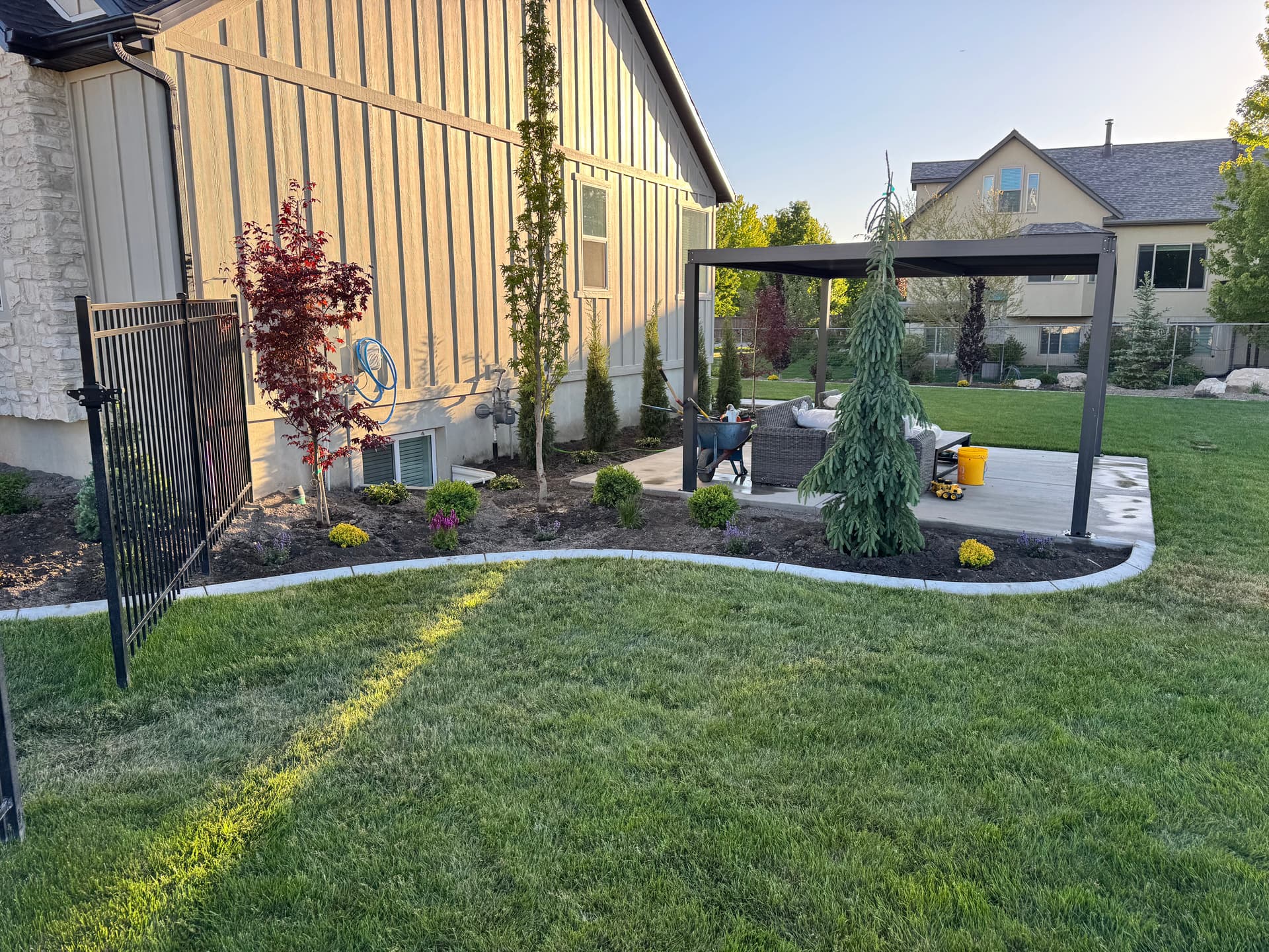 Gallery photos for Backyard Plant Installation with Trees, Boulders, and Black Mulch in Lehi: Image #3